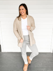 Caitie Cozy Grey Joggers Paired with White Tee Shirt and Camel colored cardigan