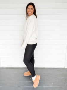 Cassie Cozy Oversized Ivory Sweatshirt with black leggings side view