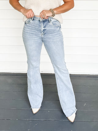 Risen Light Wash High Rise Flare Jeans Close Up | Sisterhood Style Boutique