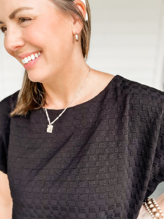 Tara Black Textured Top Texture Close Up | Sisterhood Style Boutique